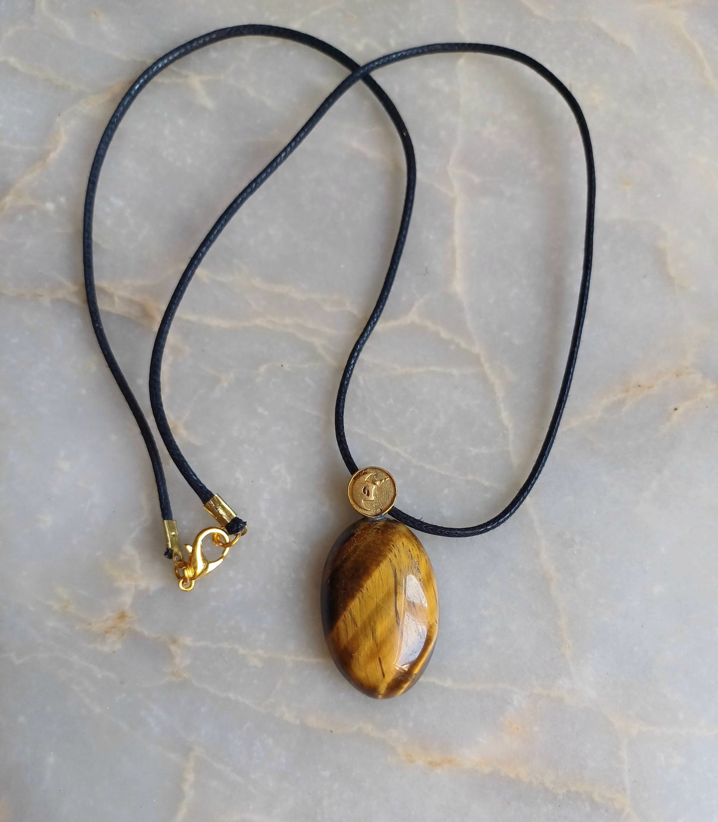 Tiger eye crystal talisman necklace under ASHA logo✨️